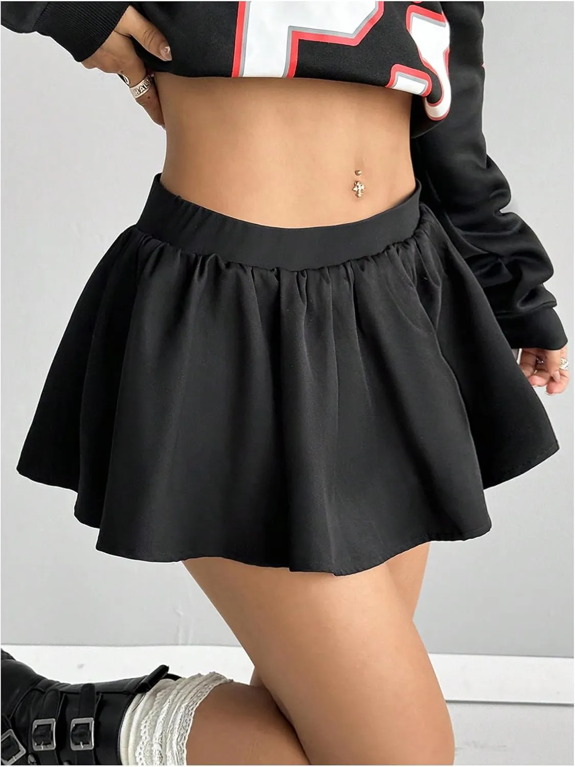 OYOANGLE Women's Ruffle Hem Elastic Low Waist Mini Skirt A Line Flared Y2K Going Out Skorts