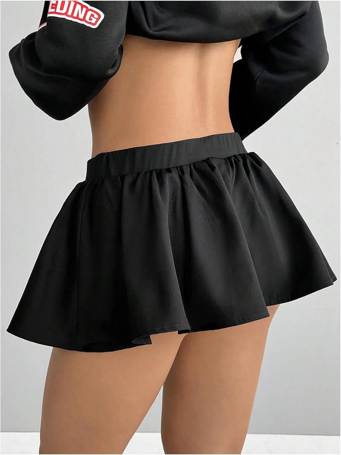 OYOANGLE Women's Ruffle Hem Elastic Low Waist Mini Skirt A Line Flared Y2K Going Out Skorts
